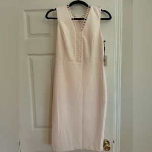 Calvin Klein size 4 sleeveless dress with circle trim new with tags